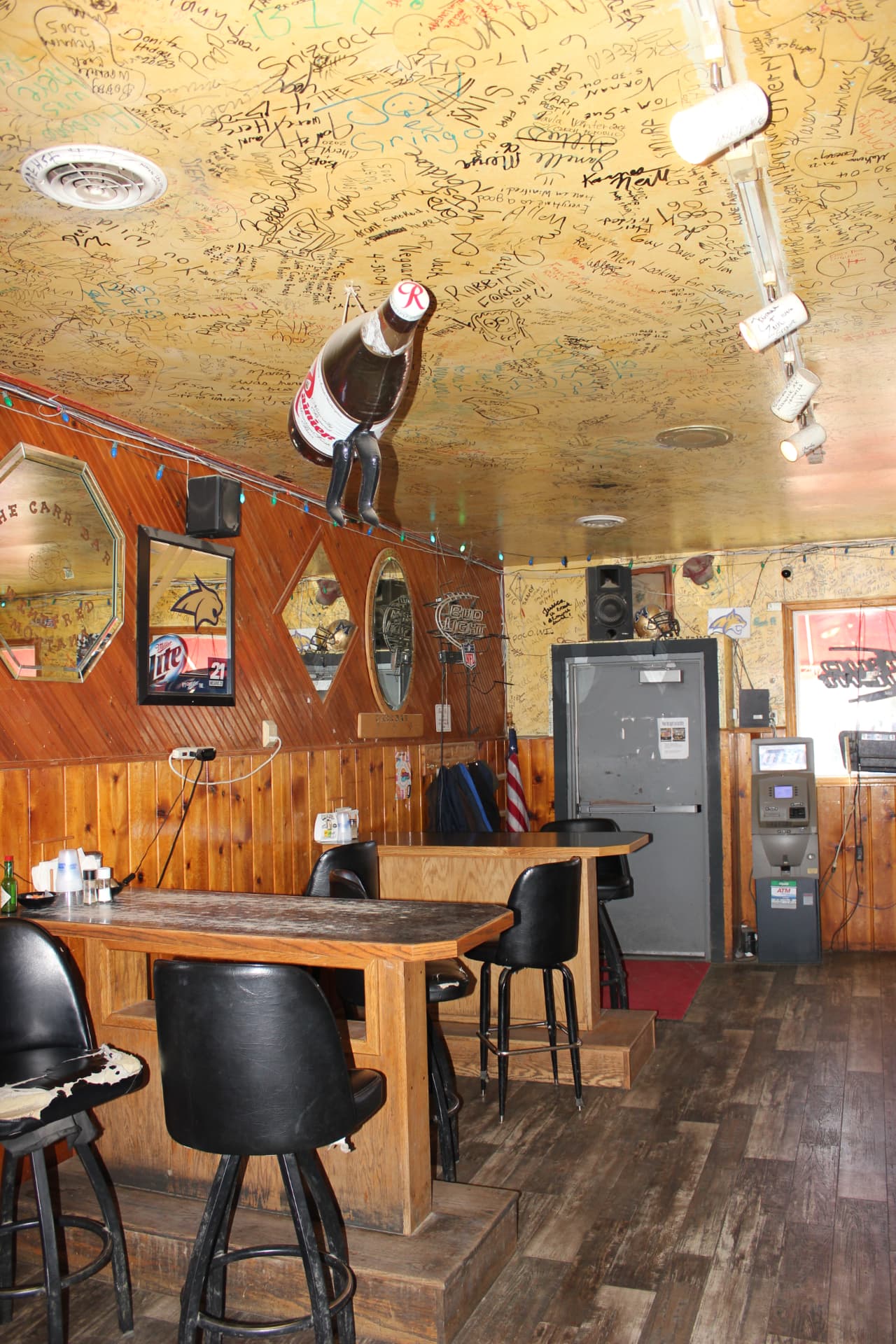 Inside Winifred Tavern — the bar, the regulars' stools and decades of character