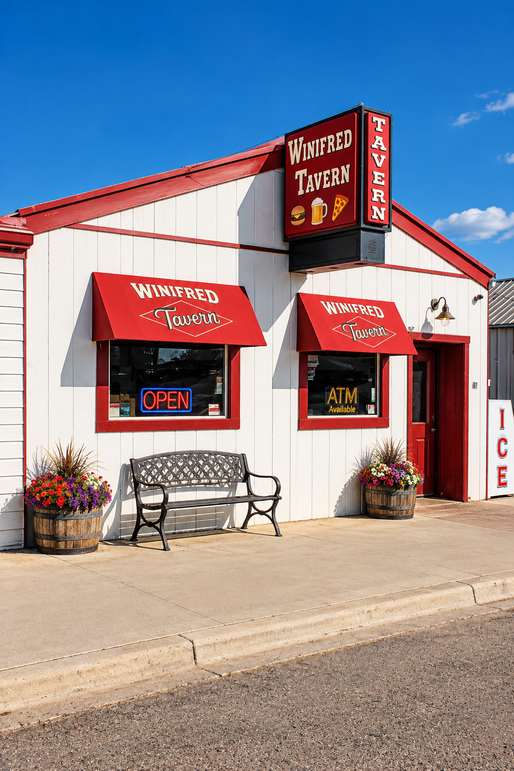 The Winifred Tavern storefront with red awnings on a sunlit street